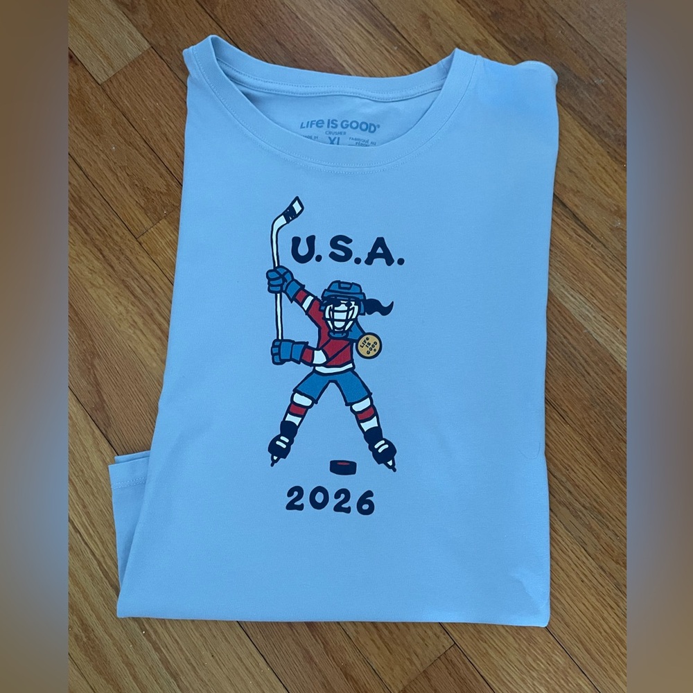 Life is Good Light Blue Tee - 2026 Women’s Hockey